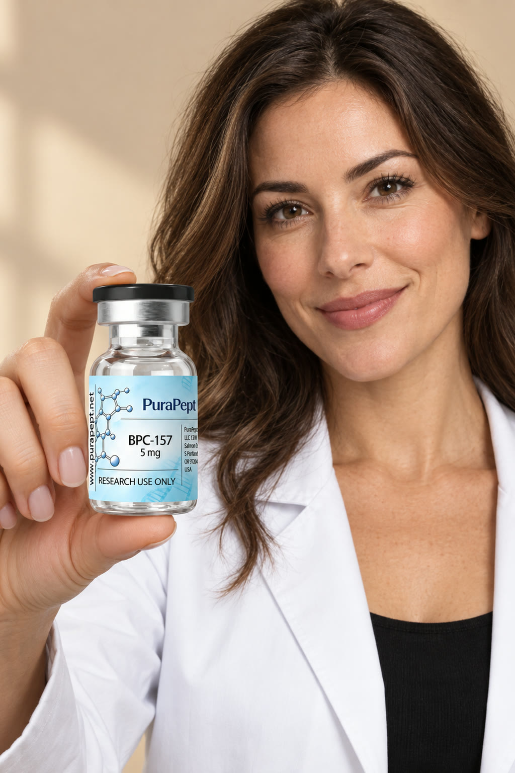 Researcher with vial